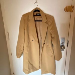 Wool camel double breasted coat.